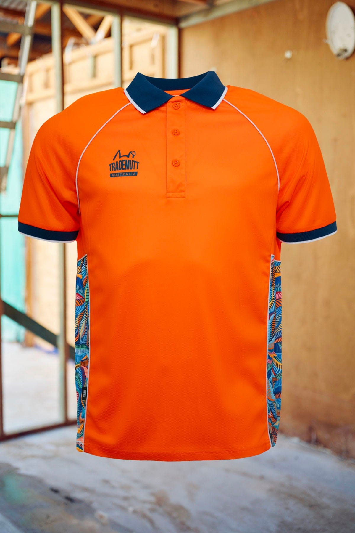 Unisex RPET Snazzy Orange Polo | TradeMutt Workshirts
